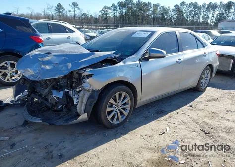 2015 Toyota Camry Hybrid Xle z USA, uszkodzony, nr VIN 4T1BD1FK2FU171082